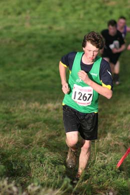 One of our young athletes negotiating one of the climbs in the second Oxford Mail Cross Country League fixture of the 2009/10 season held at Culham Park in December.