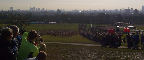 Athletes on the climb up the hill from the start at the 2009 National Cross Country Championships held at Parliament Hill.