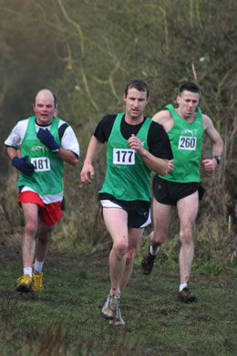 Graham Wiggins, Dan New and John Peake fighting it out in the 2009 Oxfordshire County Cross Country Championships at Horspath.