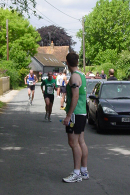 Terry Coakley about to hand over to Stephen Casey at end of his leg in the 2009 Ridgeway Relay at South Stoke on Sunday, 21 June 2009.