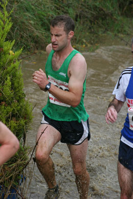Dan New negotiating the water splash at Ascott-under-Wychwood in the first Oxford Mail Cross Country League fixture of the 2009/10 season.