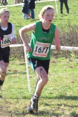 White Horse Harrier young athlete in action at the 2010 South of England Cross Country Championships held at Parliament Hill Fields, London on Saturday, 30 January 2010.