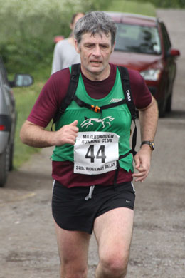 Jeremy Smeddle approaching the handover at the end of leg 8 in the 2013 Ridgeway Relay held on Sunday, 16 June.