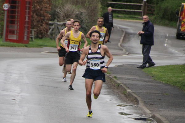 David Bruce (Highgate Harriers) leads the way through Charney Bassett in the 2014 White Horse Half Marathon.